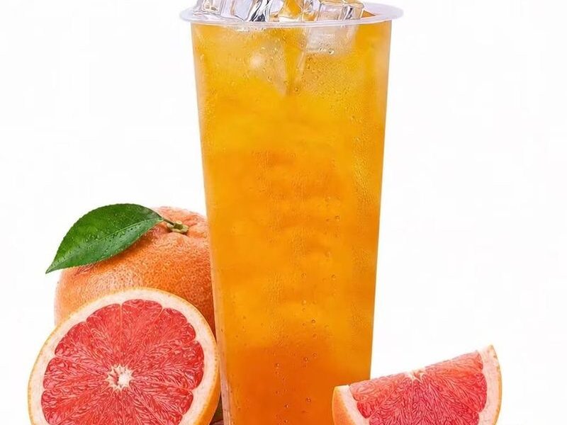 A grapefruit green tea with fresh grapefruit slices at Kawaii Tea Time